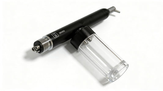 Dental sand blaster handpiece and transparent powder reservoir