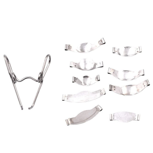 Gold Cura saddle contoured metal matrices and spring clip for Class II restorations