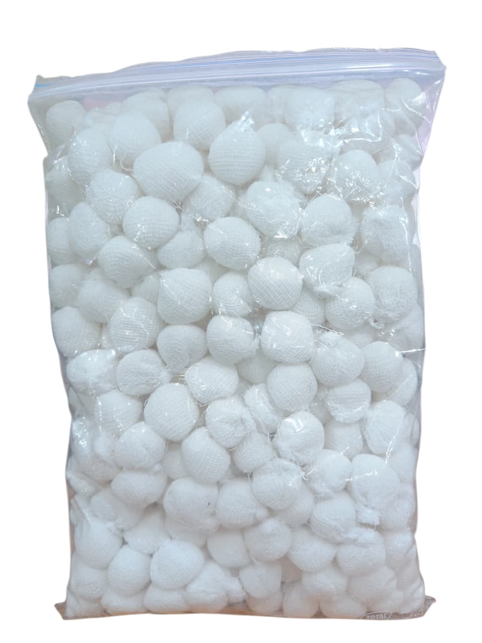 Gold Cura dental cotton balls for drying and isolation support
