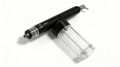 Dental sand blaster handpiece and transparent powder reservoir