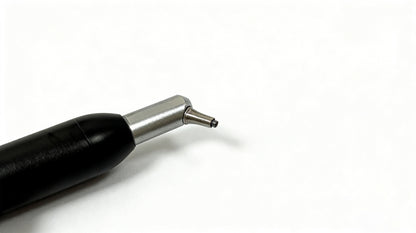 Close-up of angled 0.6 mm dental sand blaster nozzle